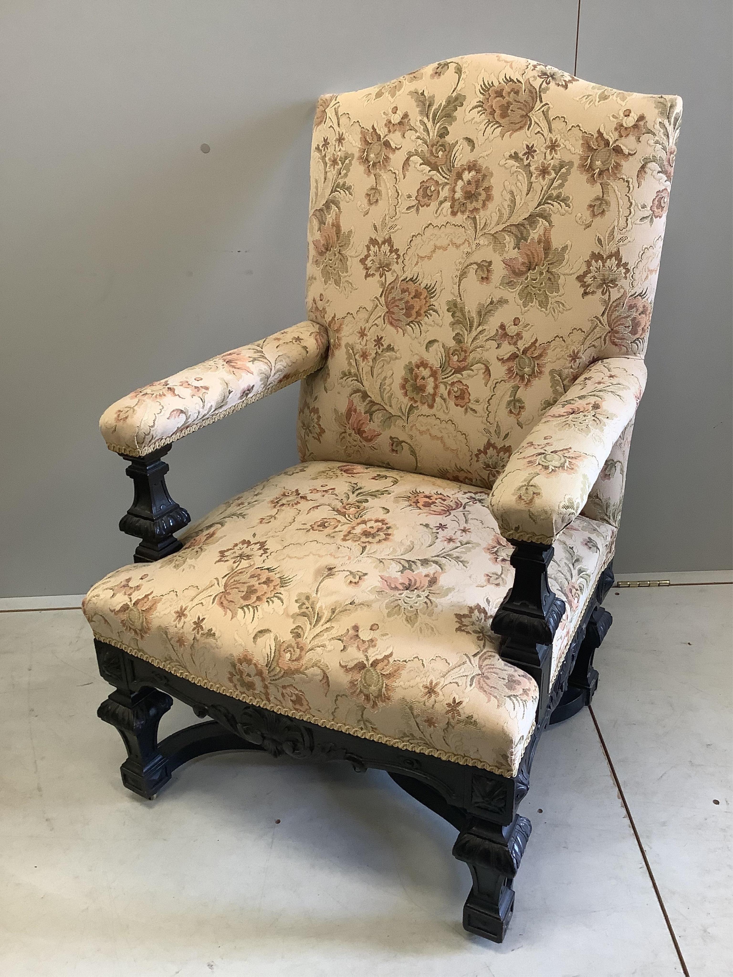 A pair of Louis XIV style ebonised upholstered armchairs, width 65cm, depth 56cm, height 103cm